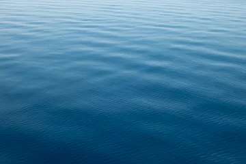 Foto op Plexiglas clear blue sea, water seascape abstract background © Tommaso Lizzul