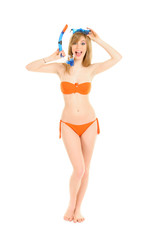 Young woman in orange bikini ready to dive