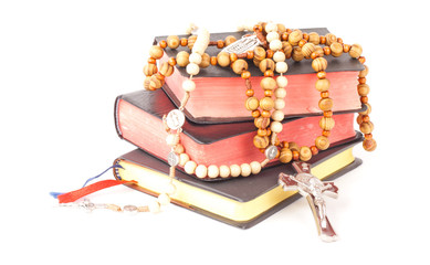 rosary and books