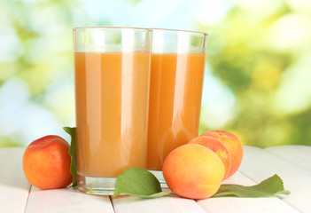 glasses of apricot juice  and fresh apricots