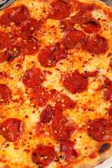 Italian pizza with hot chilli and salami