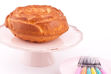 vanilla cake on a stand