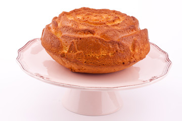 vanilla cake on a stand