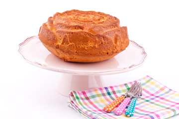 vanilla cake on stand