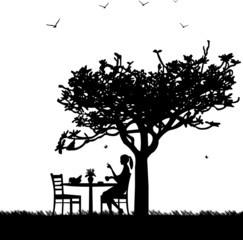 Silhouette of smoking woman with cup of coffee in garden