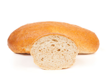 Loaf of bread with bran isolated on white
