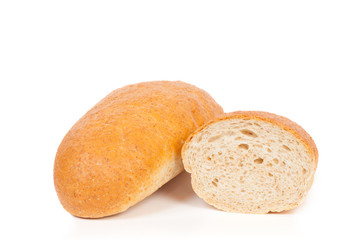 Loaf of bread with bran isolated on white