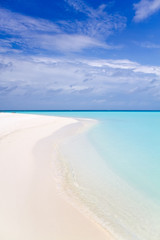 Beautiful tropical horizont, white sand beach, crystal ocean water and clear blue sky of Maldives