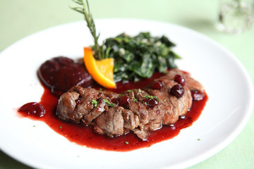 Duck confit , Roasted duck with blueberry sauce