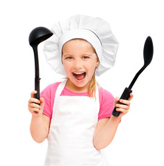 beautiful little girl with a spoon and a ladle