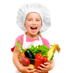 beautiful little girl with vegetables