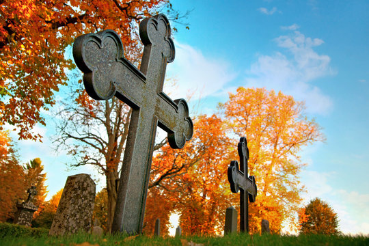 Metal cross on cemetery