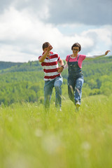 Portrait of romantic young couple smiling together outdoor