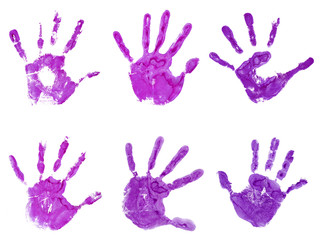 Conceptual pink painted hand shape or print isolated on white