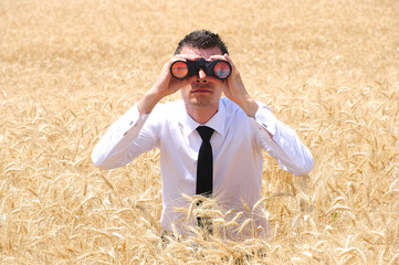 Business Man with binocular