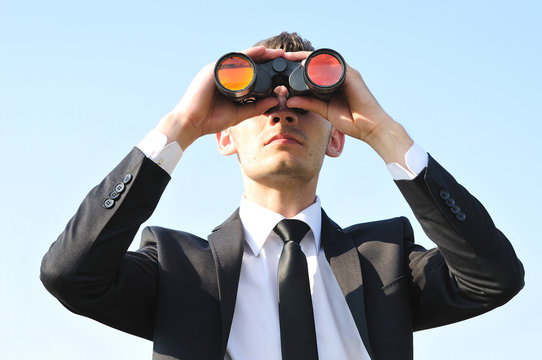 Business man with binoculars