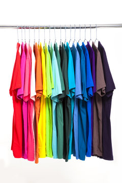 colorful t-shirt with hangers isolated on white