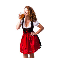 attraktive brünette Frau mit Dirndl mit Bierkrug