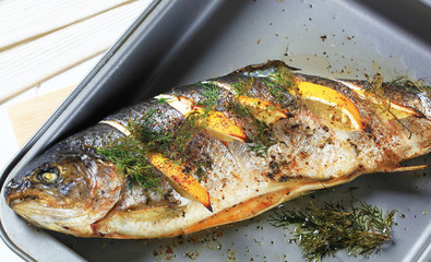Roasted trout with lemon and dill