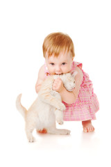 Little girl playing with kitten, isolated on white