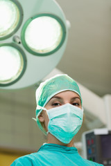 Fototapeta na wymiar Surgeon under surgical lights
