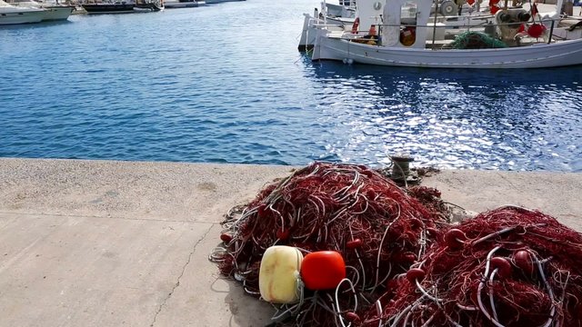 Balearic islands formentera port with trammel fisher nets buoys