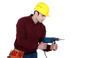 Workman with a drill