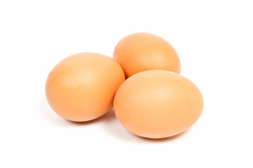  raw chicken eggs isolated on white background