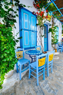 Fototapeta Greek traditional street taverna