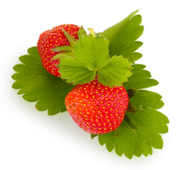 sweet ripe strawberries with leaves isolated on white