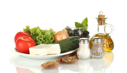 Ingredients for a Greek salad isolated on white background