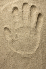 Hand in the sand