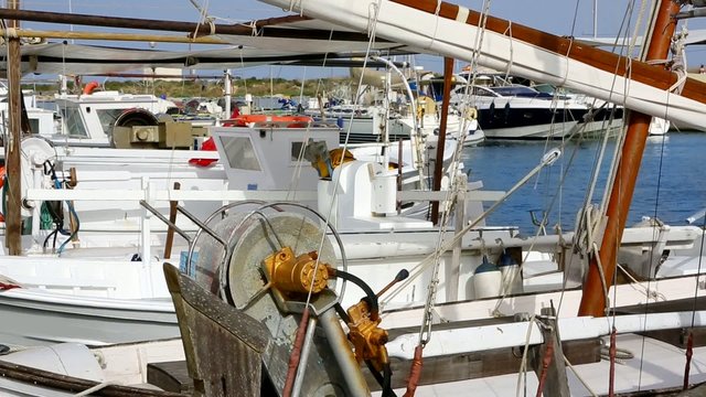 Balearic islands formentera port with trammel fisher nets buoys