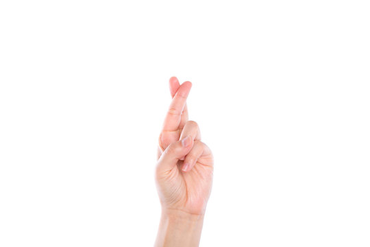 Finger crossed hand sign isolated on white background