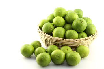 Fresh lemon in wood basketonwhite background