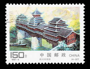 Stamp shows a traditional covered bridge