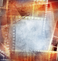Film negative strips orange background