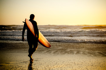Surfer walking
