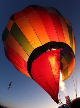 Hot air balloon being inflated at dawn, Albuquerque New Mexico USA
