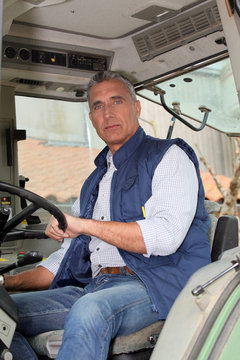 portrait of a farmer in tractor
