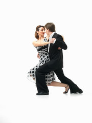 passionate dancing couple on white background