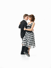 passionate dancing couple on white background