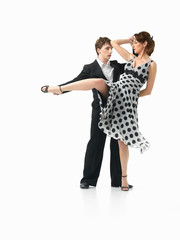 passionate dancing couple on white background