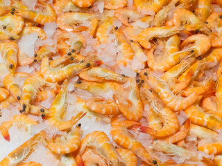 Background of whole cooked orange prawn shrimps