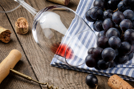 Empty wine glass on wooden table
