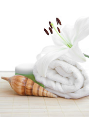 Fototapeta na wymiar white lilly and towel