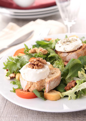 salad with walnut, bread and goat cheese