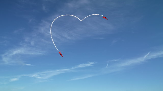 Heart shape formed by the smoke trails of jet airplanes.