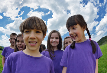 happy kids group  have fun in nature