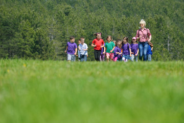 Obraz premium happy kids group have fun in nature